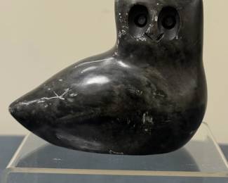 Inuit Figurine (Alaskan) - Owl Nesting | Stone carving of an owl nesting.
Soapstone carving
Signed by artist (bottom): [indistinguishable] and "CANADA"
Titled by artist: N/A
Numbered by artist: N/A


