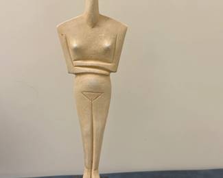 Modern Greek Style Figurine | Modern sculpture inspired by Early Cycladic (Greece) figurines, characterized by abstract, marble-like forms with folded arms and simplified features. - h. 17 x w. 4 in