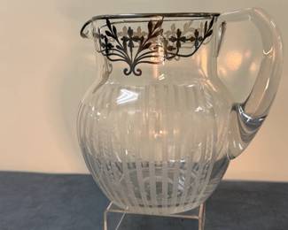 Glass Pitcher with Silver Trim | Antique (1920s) glass pitcher with silver overlay trim (likely sterling silver) and etched details along the glass body. - h. 7 in