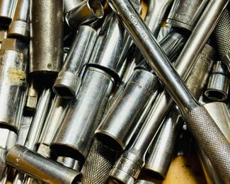 Various Sockets and Ratchet Wrenches.