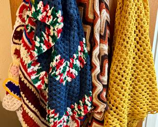 Selection of Afghans and Quilts.