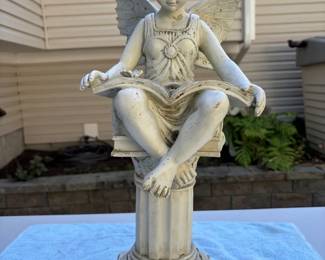 Fairy Reading On Pedestal