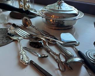 Lots of silver plate. Beautiful !!