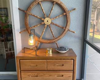 Ships wheel $250, Bespoke lamp $44, Dresser $40