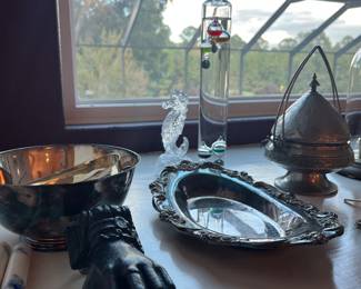 Cast iron door knocker , silver plate antique butter cooler and more.