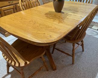 Oak double pedestal dining table 40" X 56" plus 2-12" leaves & 6 Windsor back chairs - matching china cabinet - the son believes this was Amish made
