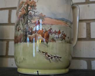 Equestrian pottery pitcher