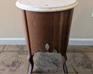 Antique side table with round marble top