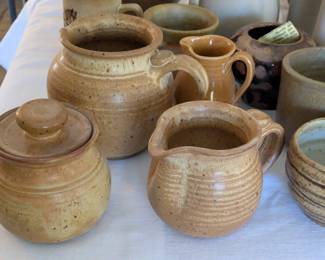 Brown pottery signed Thicker