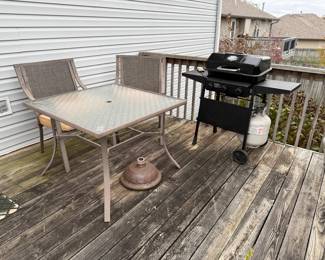 Outdoor table and chairs with umbrella