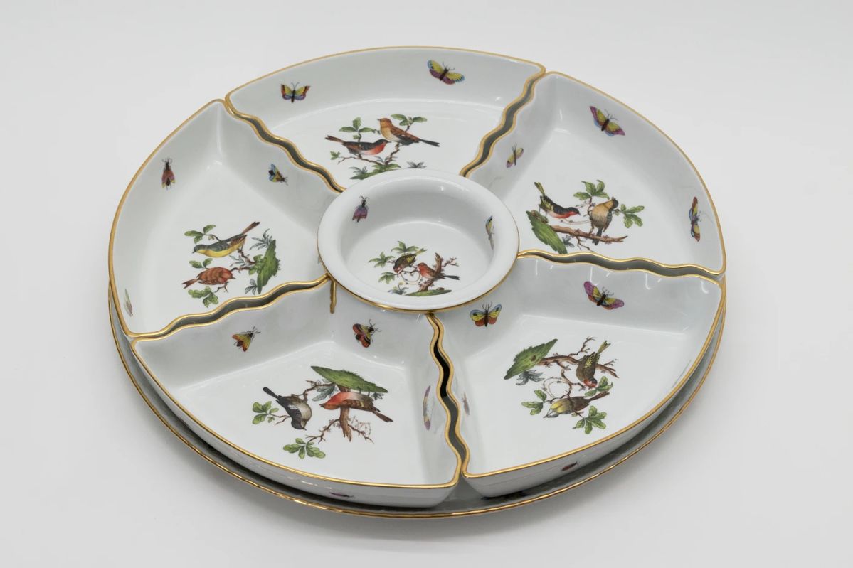 A Herend porcelain “Rothschild Bird” 7-piece hors d'oeuvres set in six divided sections on top of a large 12.5" serving platter. Hallmarked with “Herend Hungary Hand Painted” to the underside.