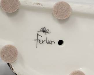 Closeup of the base of the vintage porcelain Schnauzer dog flat back figurine