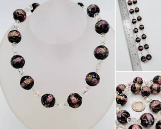 A vintage Venetian Murano "wedding cake" glass bead necklace in black glass with coppery gold, pink and blue decoration, with faced clear Aurora Borealis crystal beads