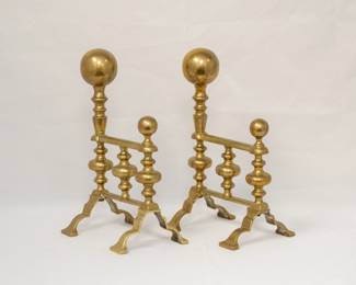 A pair of American brass baluster-form ball-top andirons on variously knopped support and cabriole legs