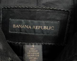 Closeup of Banana Republic woman’s black lambskin leather jacket size S, biker motocross style zip front leather jacket