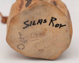 Closeup of Hopi Kachina dolls hand crafted and signed by Native America artist Silas Roy