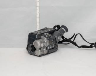 A vintage Sharp VL-MX7 Hi8 camcorder featuring a unique twin-lens design