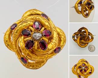 A lovely and large Georgian 18-karat gold brooch or pendant set with rhodolite garnets and large mine cut diamond in the center, has a pendant ring so it can be worn as a brooch or a pendant  