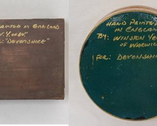 Another view of the three vintage wooden hand-painted trinket boxes, each with the portrait of a dog on the lid. Two of the boxes are marked on the base with "hand painted in England by: Winston Yeatts of Warwickshire for: Devonshire"