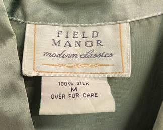 Closeup of vintage Field Manor light olive green silk long sleeved blouse size M