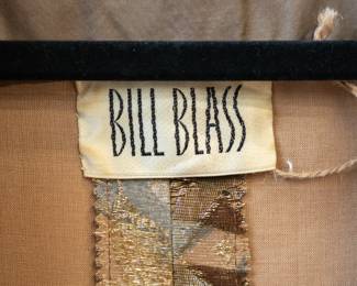 Closeup of Bill Blass fur-trimmed brocade coat
