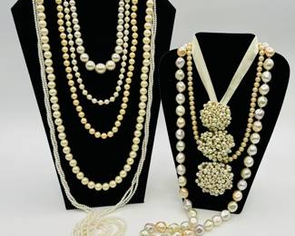 A selection of fashionable Faux pearl necklaces in a variety of tones and lengths