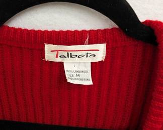 Closeup of Talbot's red wool cardigan sweater, size M