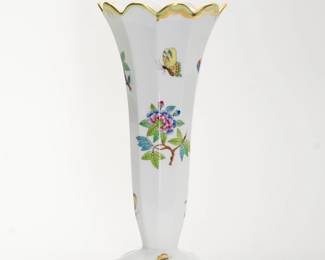 Herend Porcelain Queen Victoria Pattern Scalloped Vase – Hand-painted with exquisite detail in Hungary, this scalloped rim vase has vibrant butterflies and lush florals, accented with delicate gilded accents. 8 1/2 inches H. Style No. 7075-VBA. Herend makers marks on the underside.