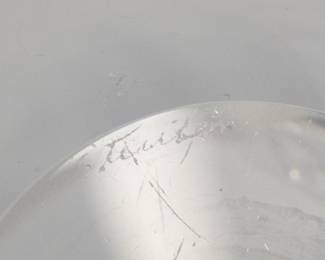 Closeup of base of one of the pair of mid-century modern signed Steuben Glass "teardrop" stoppered liqueur decanters, designed by Donald Pollard in 1953 