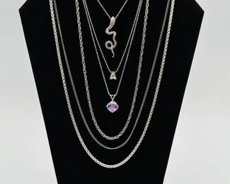 Silver tone chain and pendant necklaces, and a sterling silver serpent pendant on sterling silver chain