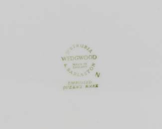 Closeup of mark on the Nine Piece Wedgwood Embossed Queen's Ware Set includes coffee pot with lid, sugar with lid, creamer, two soup dishes, large platter, and medium platter.