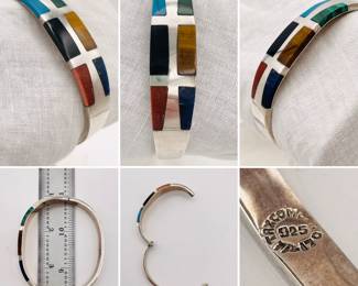A fantastic vintage Mexican sterling silver hinged bracelet inset with different color natural stone pieces, and stamped on the inside with Taxco, Mexico, artist name, and 925 for sterling