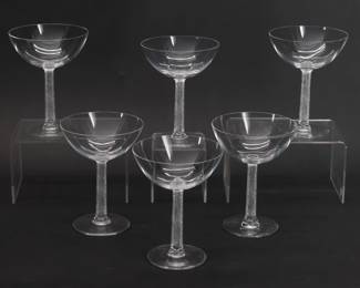 Six signed Lalique Phalsbourg pattern champagne/tall sherbet glasses, 5 1/2 inches H. Each squared, frosted stem is molded with grape vines. Originally designed under Rene Lalique in 1924, this pattern was made 1924 - 2021, and each glass is etched Lalique France on the underside of the foot in script.   
