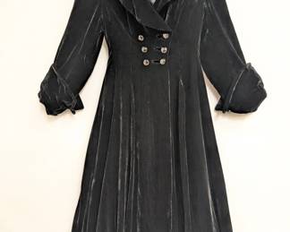 Vintage black velvet double-breasted coat with large cuffs, full skirt and faceted metallic buttons