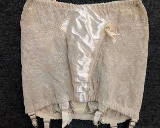 Vintage women's girdle with garter straps
