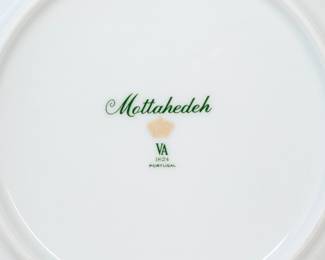 Reverse view of eight Mottahedeh porcelain plates in Summer Fruit pattern; made in Portugal.