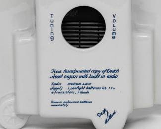 Another view of the vintage Delft Holland hand-painted ceramic musical miniature street organ with battery powered radio