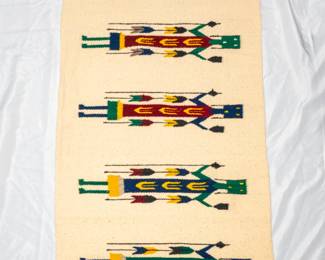A handwoven Native American Navajo Yei rug/tapestry, the figures depicted are known as Yei or Yeibicheii in Navajo culture, representing spirit deities.