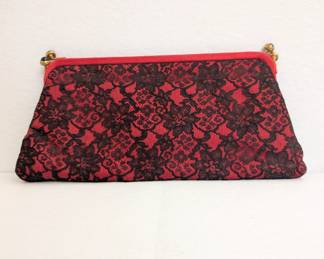 A vintage red and black lace evening clutch bag with kiss-lock clasps, the interior vivid red with interior pockets and a matching small coin purse