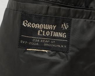 Inside view of the wonderful vintage men's black silk evening coat