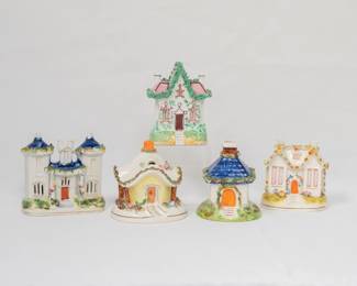 A collection of Staffordshire pottery including a Staffordshire model of a house, two towers & grand entrance – even moss on the roof – c. 1865; and several charming antique pastille burners modeled as cottages and houses
