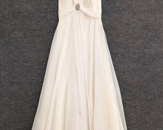 A fabulous 1970s vintage Mike Benet Formals white chiffon halter dress with rhinestone clip