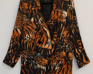 A vintage Yves Saint Laurent animal print silk jacket, size 40, made in France