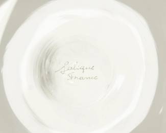 Closeup of the vintage signed Lalique France frosted and clear crystal hawk ring dish