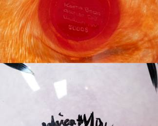 Closeup of the Kosta Boda "Open Minds" series footed glass compote or vase designed and signed by arist Ulrica Hydman Vallien