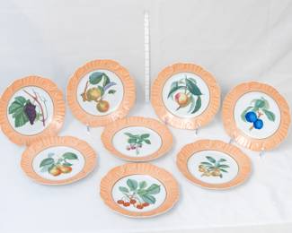 Eight Mottahedeh porcelain plates in Summer Fruit pattern; made in Portugal.