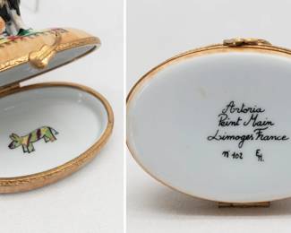 More view of the Artoria Limoges Porcelain Box Chihuahua Mexican Dog in Sombrero – Hand painted French Limoges porcelain oval shaped trinket box by Artoria Limoges, Chihuahua dog wearing a sombrero perched atop the lid. White glazed interior painted with a small colorful donkey. Artist's mark on underside of the base.