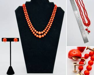 A double strand graduated size coral bead necklace with 14k gold clasp, and 14k gold screwback coral button earrings