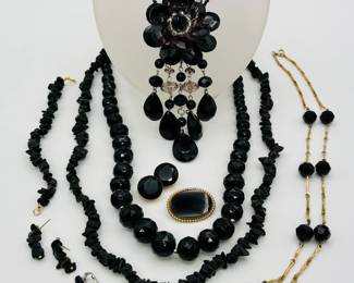 When you need some dramatic black jewelry – here's a polished natural black stone necklace, earrings and bracelet set; a dramatic black beaded floral statement necklace, variety of earrings and more