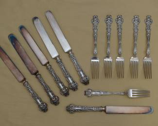 Sterling silver forks and knives, 6 of each, with elaborate finely worked floral pattern